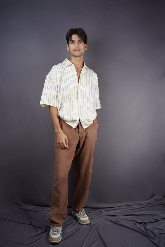 Ivory all-over threadwork oversized shirt.