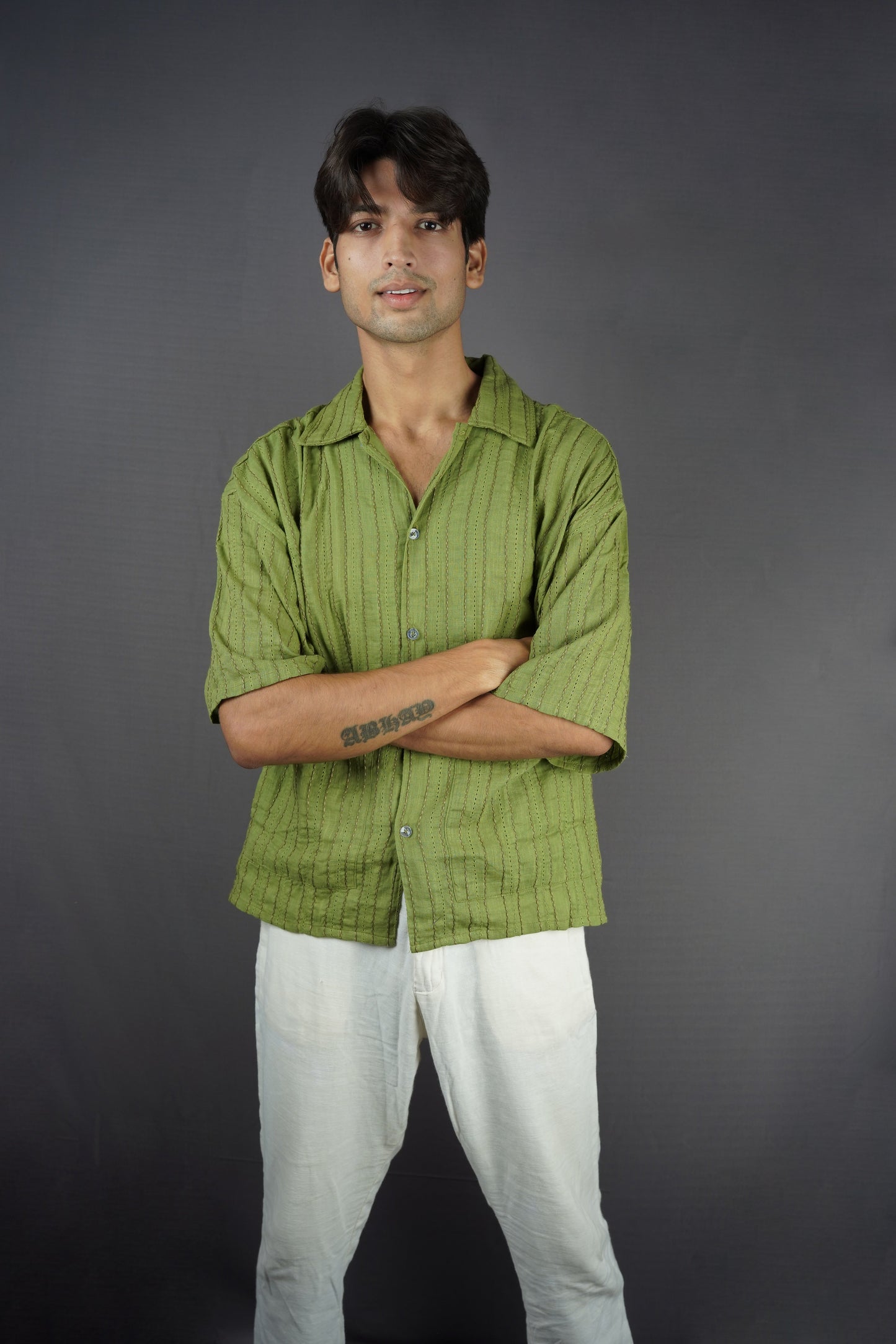 Olive green all-over threadwork oversized shirt.