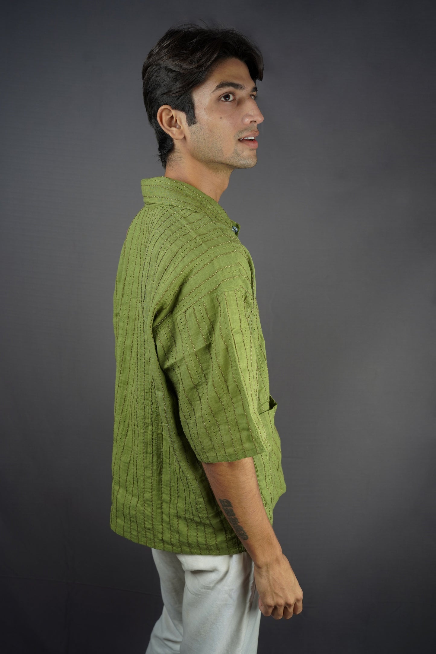 Olive green all-over threadwork oversized shirt.