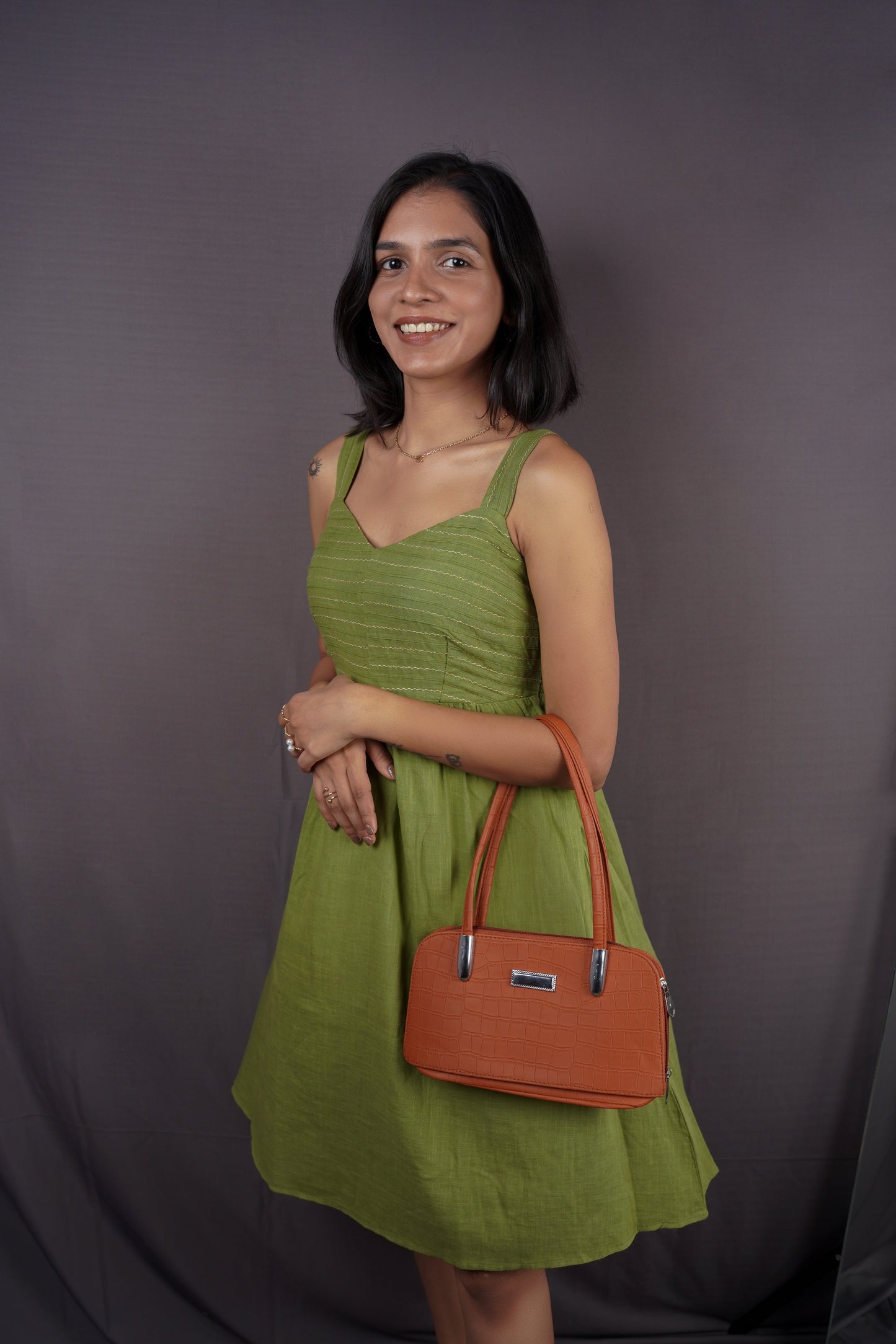 Olive green strap dress.